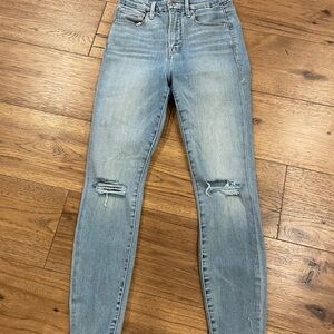 Distressed skinny jeans size 27